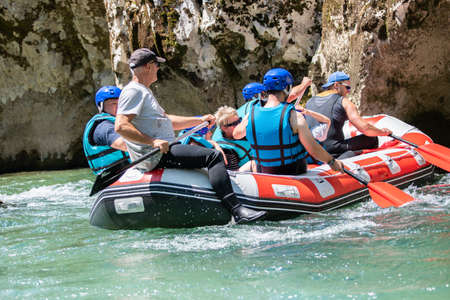 Rafting team stucked on the riverの写真素材