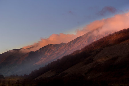 mountain at sunset with fog in matese park