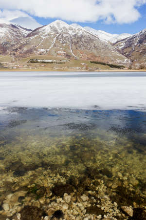 view of frozen mountain lakeの写真素材