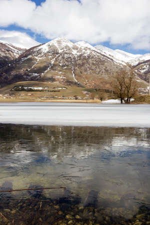 view of frozen mountain lakeの写真素材