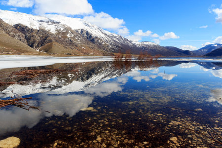 view of frozen mountain lakeの写真素材