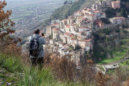 hiker on mountain trail at pietravairano villageの写真素材
