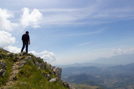 Hiker on mountain trailの写真素材