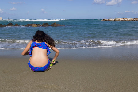 girls play on beach chiaia forio ischiaの写真素材