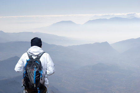 Hiker on the summit of a mountain in matese park