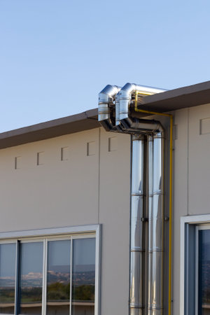 metal pipes on modern building