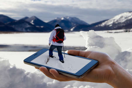 hiker on mountain and snow in pop out effectの写真素材