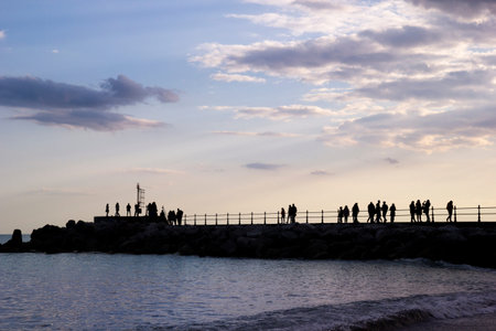walkway on the promenade at sunset in Amalfiの写真素材