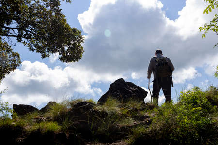 hiker on the top of a mountain in Rocchetta e Croceの写真素材
