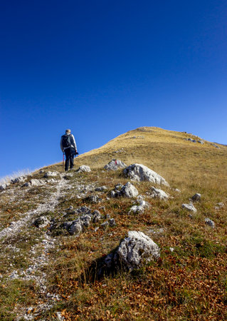 hiker on the top of a mountain in matese parkの写真素材