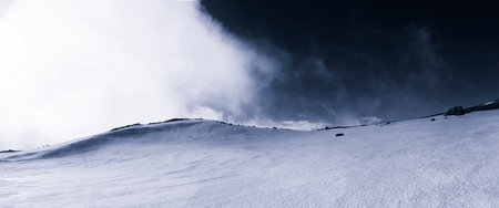 mountain peak with snow and sky Mutria matese parkの写真素材