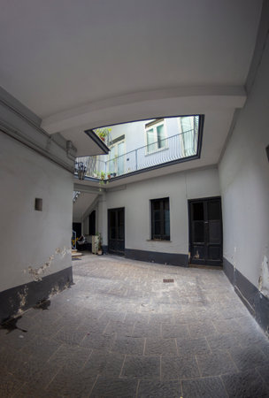 old tipycal interior staircase of aversaの写真素材