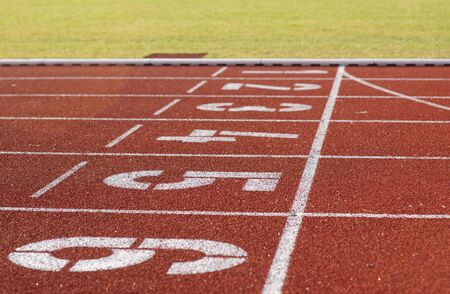 Stadium and running track - start finish numbered from one to sixの写真素材