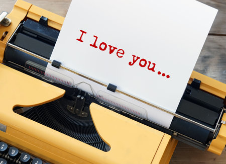 A Classic Typewriter paired beautifully with a heartfelt Love Note for all occasionsの写真素材