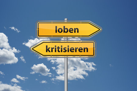 Direction Sign The Contrast Between Praise And Critique In Communication And Feedbackの写真素材