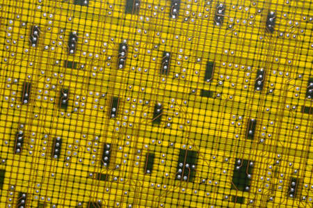 texture of yellow circuit boardの写真素材