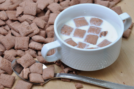 Bowl of milk and breakfast chocolate crunchy 