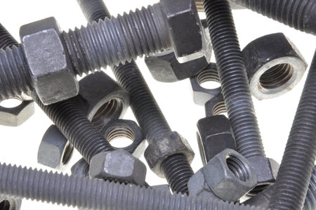 Heavy industry, bolts and nuts isolated on white background 