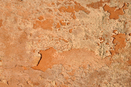 Erosion on the old clay surface, natural texture 