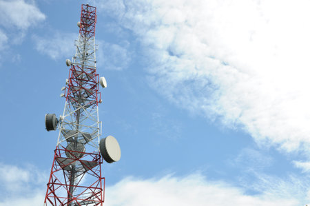 Tower with cell phone antenna system against
