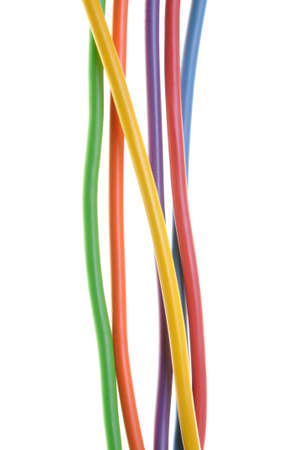 Bundles of electric computer cables on a white background の写真素材