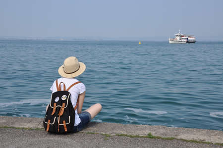 Loneliness teenagers at the sea shore の写真素材