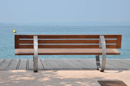 Bench at the lead shore の写真素材
