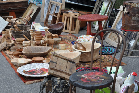 Flea market with old wooden items の写真素材