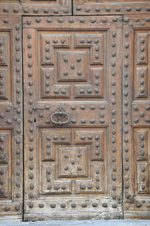 Old wooden door Trento Italy の写真素材