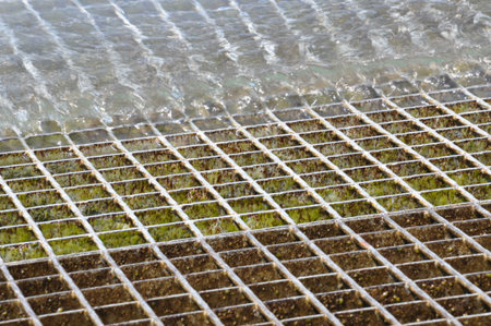 Sea water with grid n the port, texture background 