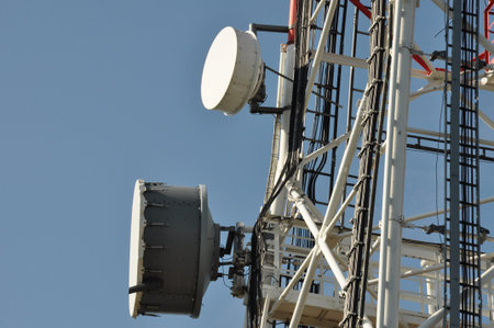 Telecommunication tower with cell phone antenna system 