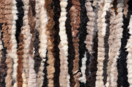 Treated warm sheepskin leather backgroundの写真素材