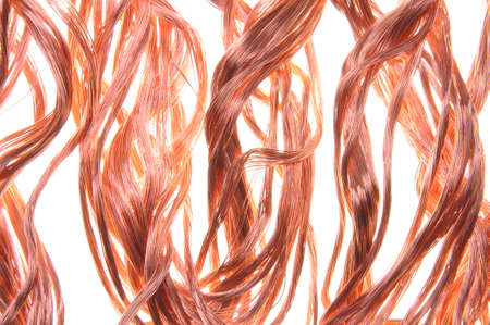 Red copper wire, industrial object on a white background の写真素材