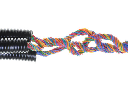 Corrugated pipe with cables isolated on white  