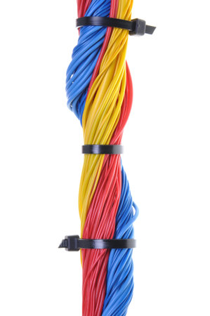 Electrical wires with cable ties isolated on white background 