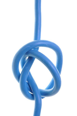 Blue electrical cables isolated on white background の写真素材