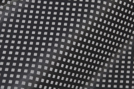 Shiny metal surface background with square holes 