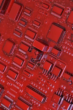 Old red computer circuit boardの写真素材