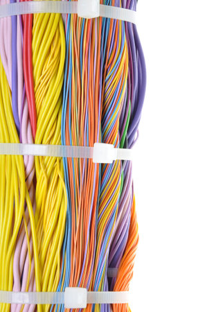 Bundle of cables with cable ties isolated on white background 