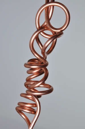 Twisted copper wire, the flow of electricityの写真素材