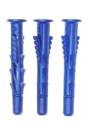 Blue plastic dowels on isolated white backgroundの写真素材