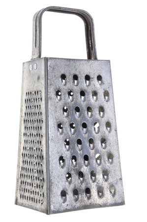 Old kitchen grater isolated on white backgroundの写真素材