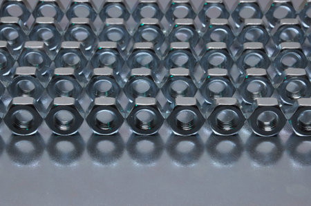 Nuts on sheet surface in regular patternの写真素材