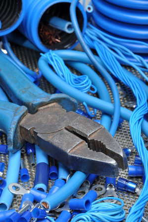 Pliers with electrical component kit for use in electrical installations