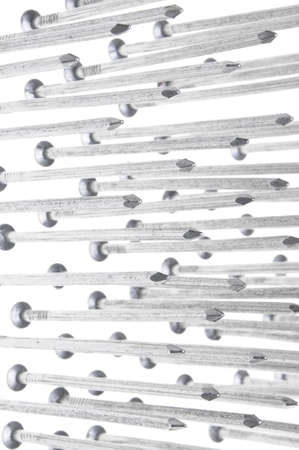 Steel nails on white backgroundの写真素材