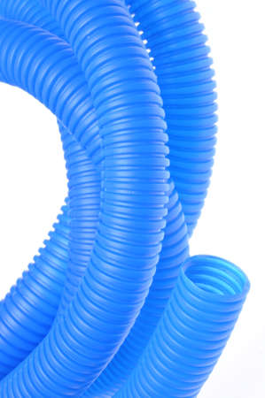 Blue plastic corrugated pipe isolated on white backgroundの写真素材