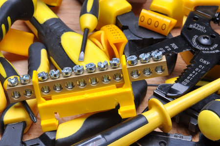 Tools for electrical installation on wooden board