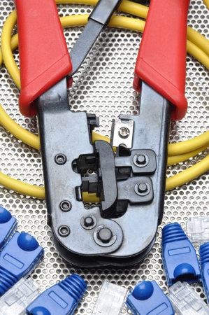 Crimping tool with network cable and connectors