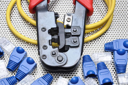 Crimping tool with network cable and connectorsの写真素材