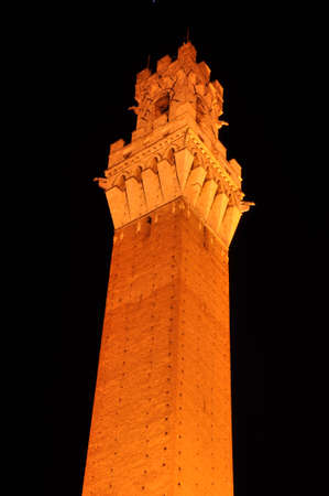 Night photo. Torre del Mangia tower, Siena, Tuscany, Italyの写真素材